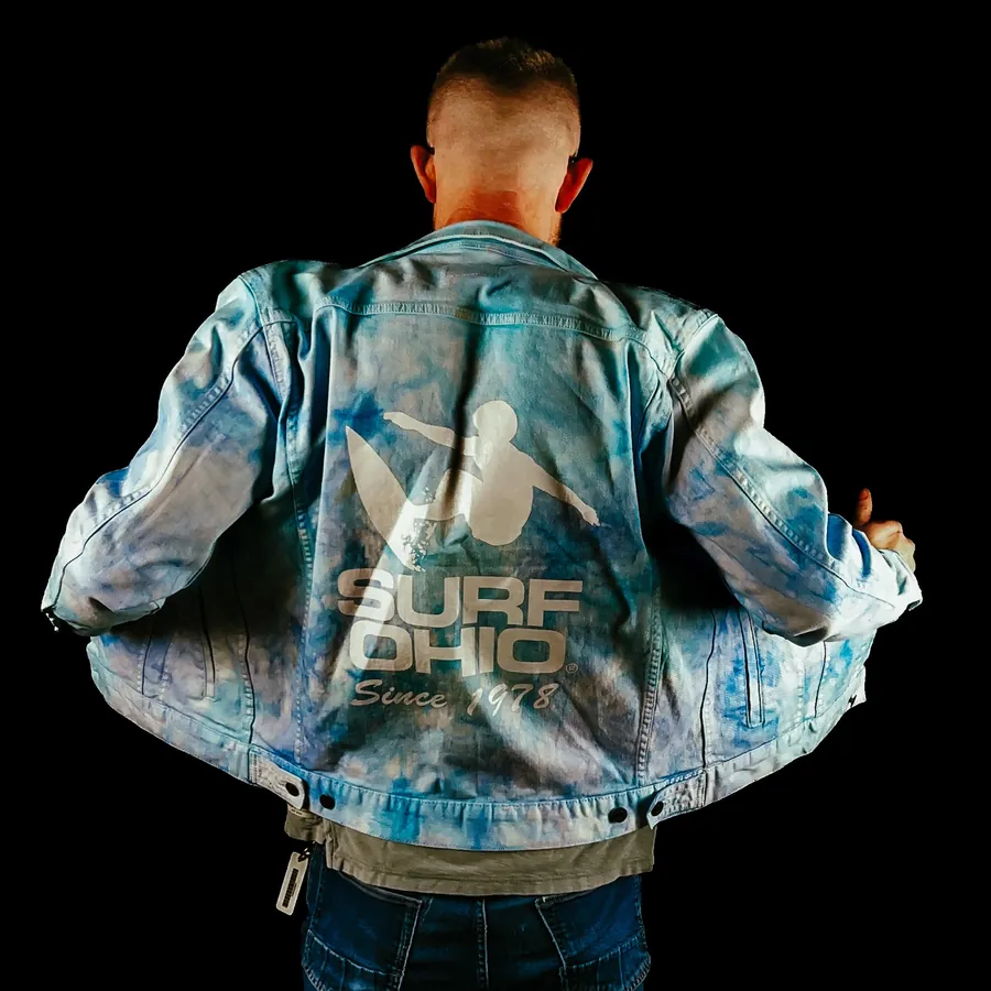 Surf Ohio® tie-dye denim jacket with a back print